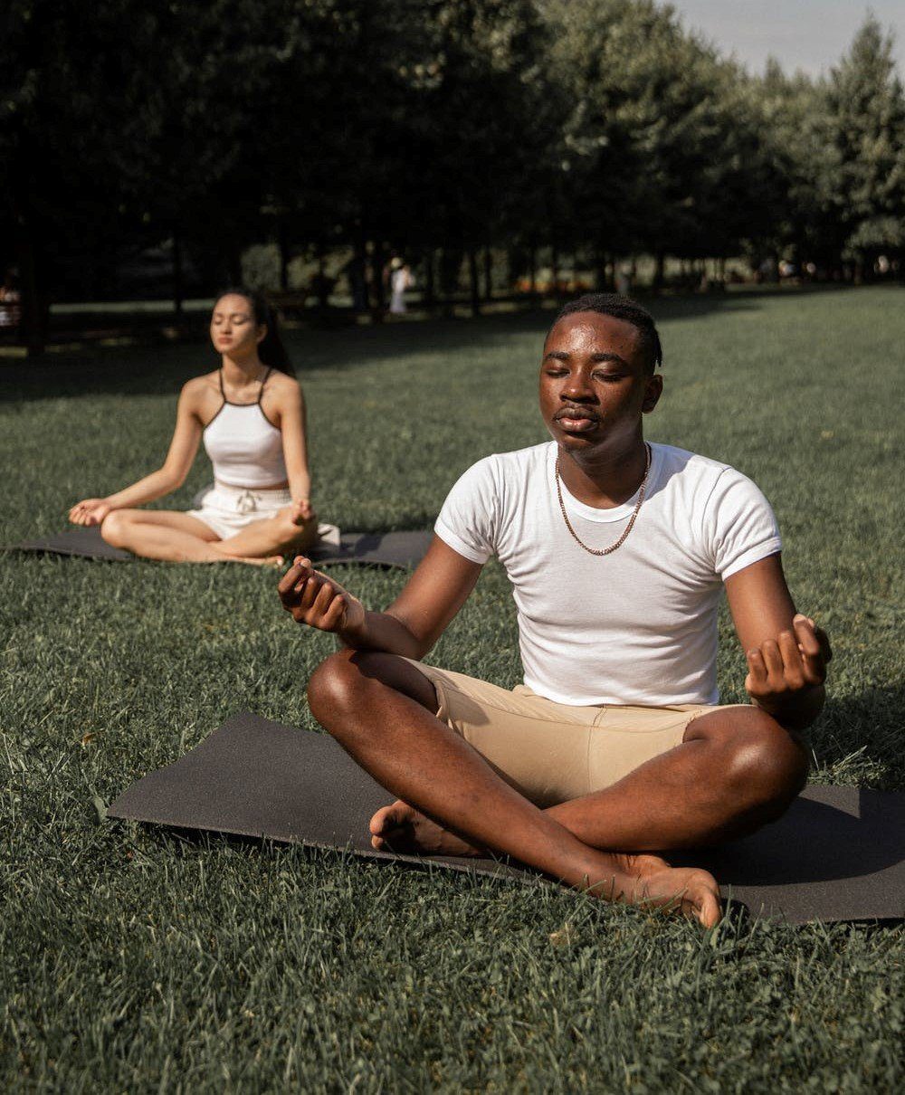 two persons meditating